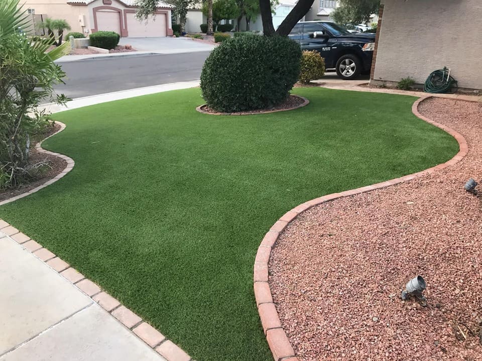 A great mixture of plants with artificial turf can create a welcome sight for sore eyes. 