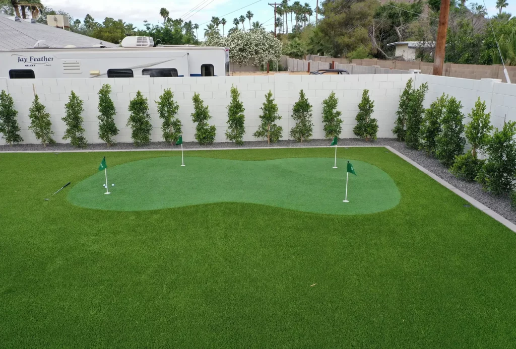 Backyard golf green installed by Paradise Greens