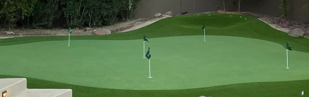 Backyard golf green installed by Paradise Greens