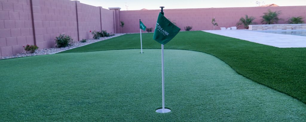 Backyard golf green installed by Paradise Greens